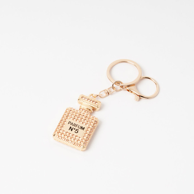 Charm Chanel parfymflaska guld Rosenvinge